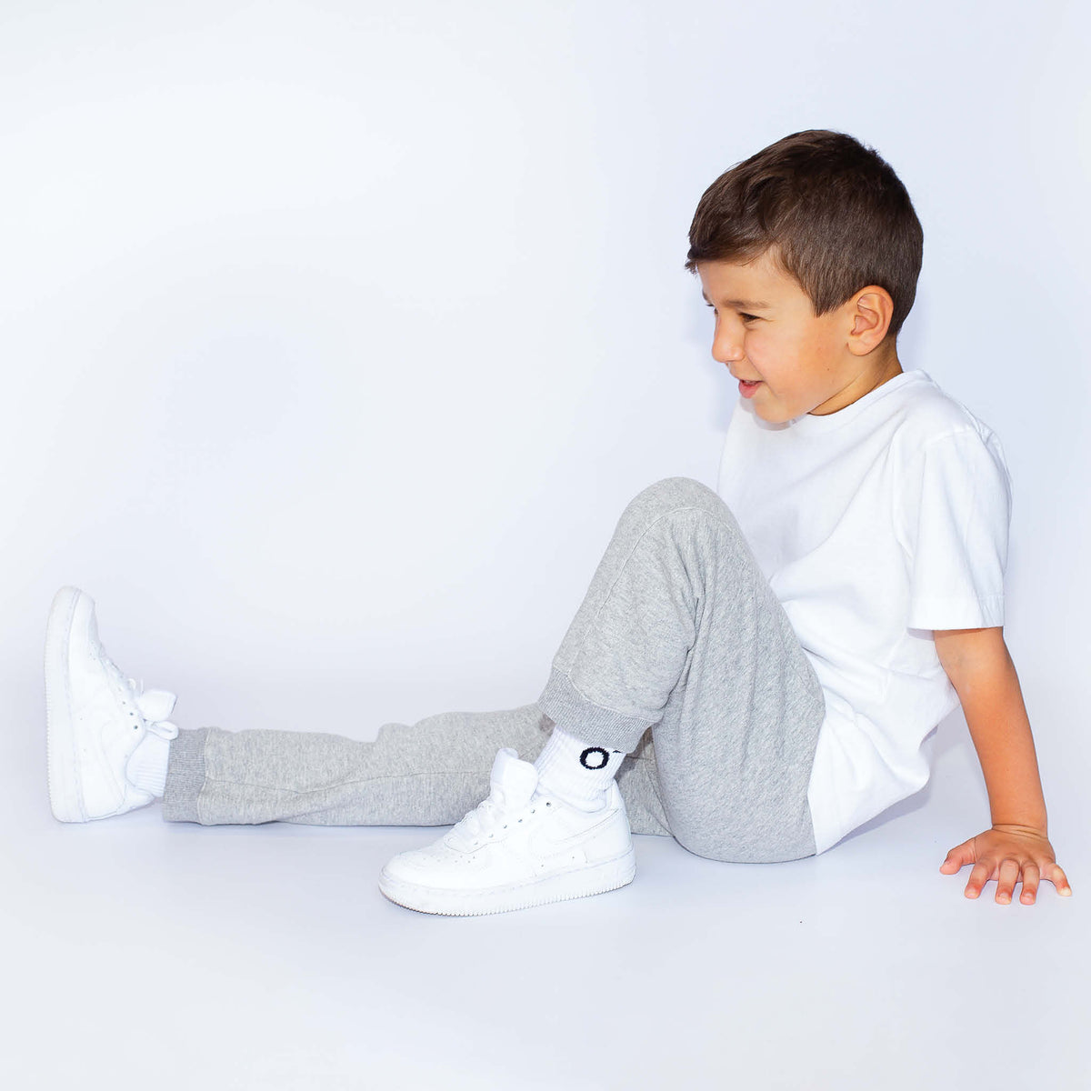 Happy Boy Wearing Grey Track Pants Boa Basics